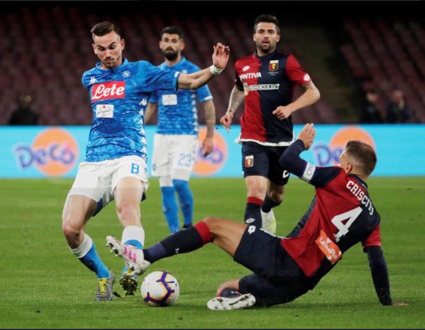 Victor Osimhen of Napoli and Stefano Sabelli of Genoa vie for the