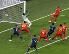 France's Samuel Umtiti, 2nd right, scores the opening goal during the semifinal match between France and Belgium at the 2018 soccer World Cup in the St. Petersburg Stadium in St. Petersburg, Russia, Tuesday, July 10, 2018. (AP Photo/Thanassis Stavrakis)