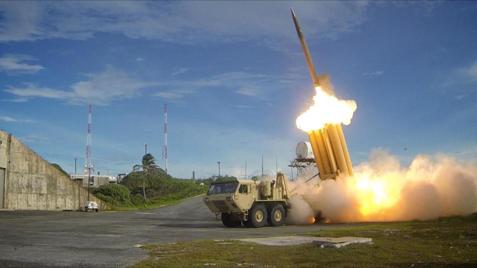 The first of two Terminal High Altitude Area Defense THAAD interceptors is launched during a successful intercept test. The test, conducted by Missile Defense Agency MDA, Ballistic Missile Defense System BMDS Operational Test Agency, Joint Functional