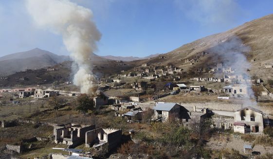 Armenia_Azerbaijan_Burning_Houses_19639.jpg-a21bb_c0-160-4000-2491_s561x327