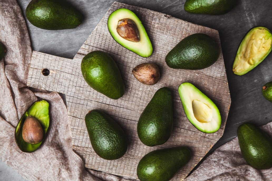 Avocado. Useful food on the table. Country style