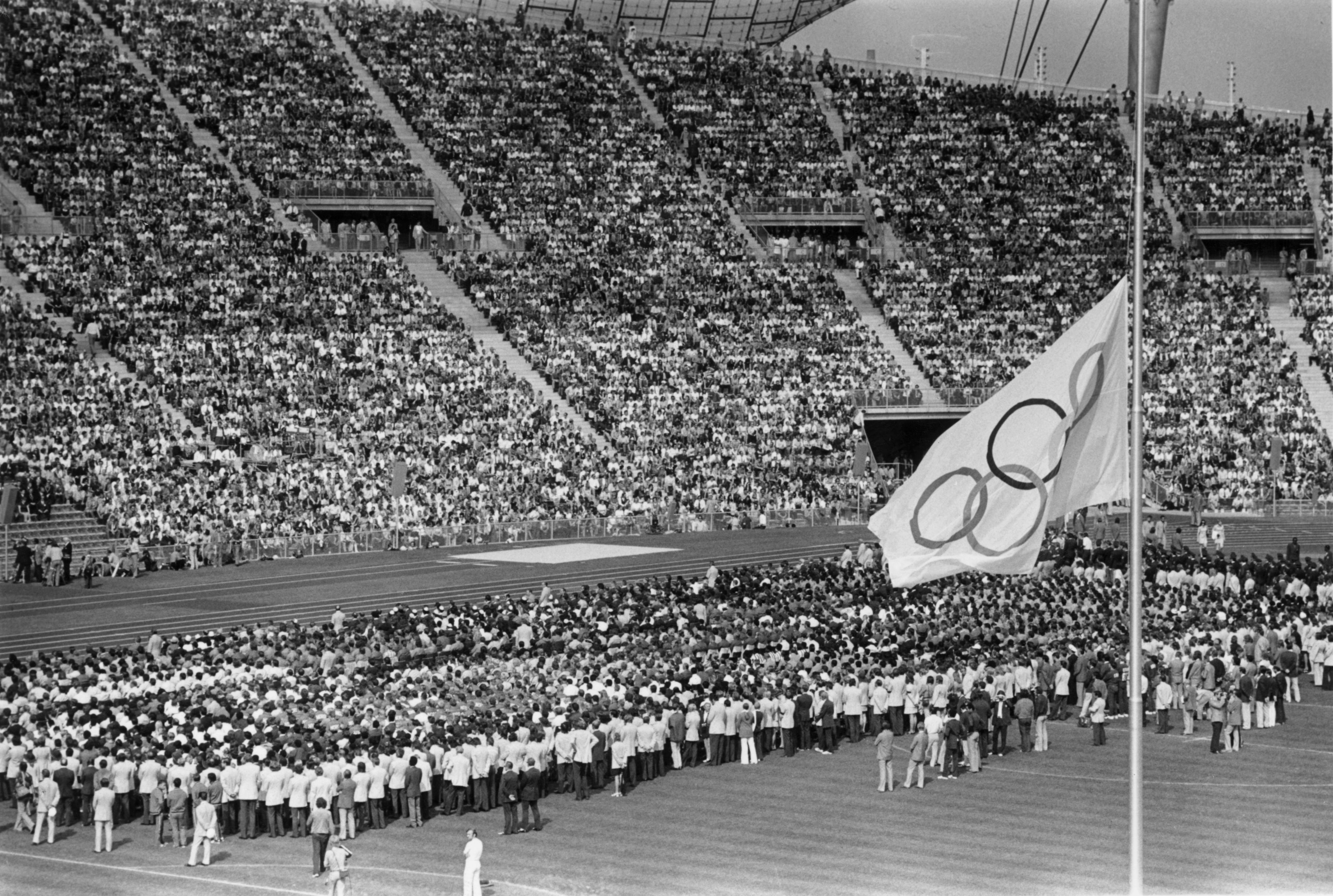 6th September 1972:  The Olympic flag flying at half-mast in the Olympic Stadium in Munich during the memorial service for the Israeli athletes who were killed by Arab terrorists the previous day.  (Photo by Keystone/Getty Images)