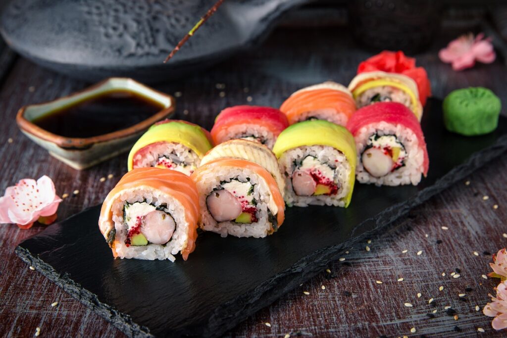 Rainbow,Sushi,Roll,With,Salmon,,Eel,,Tuna,,Avocado,,Royal,Prawn,