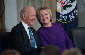 UNITED STATES - DECEMBER 08: Vice President Joe Biden and former Secretary of State Hillary Clinton attend a portrait unveiling ceremony for retiring Senate Minority Leader Harry Reid, D-Nev., in Russell Building's Kennedy Caucus Room, December 08, 2016. (Photo By Tom Williams/CQ Roll Call)