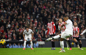 Real Madrid's Kylian Mbappe fails to score a penalty during the Spanish La Liga soccer match between Athletic Bilbao and Real Madrid at the San Mames stadium in Bilbao, Spain, Wednesday, Dec. 4, 2024. (AP Photo/Miguel Oses)