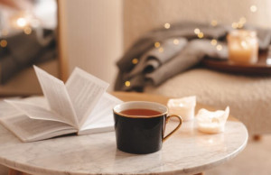 Cup,Of,Tea,With,Paper,Open,Book,And,Burning,Scented